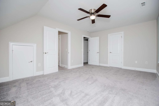 5995 Azalea Ridge Dr, Douglasville, GA 30135 - unfurnished bedroom with carpet, baseboards, vaulted ceiling, and a ceiling fan