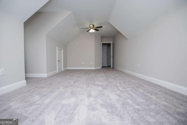 5995 Azalea Ridge Dr, Douglasville, GA 30135 - additional living space with a ceiling fan, carpet flooring, vaulted ceiling, and baseboards