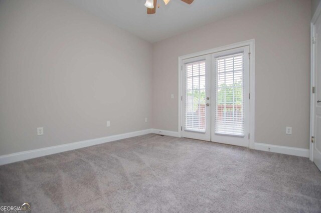 5995 Azalea Ridge Dr, Douglasville, GA 30135 - carpeted empty room featuring ceiling fan, french doors, and baseboards