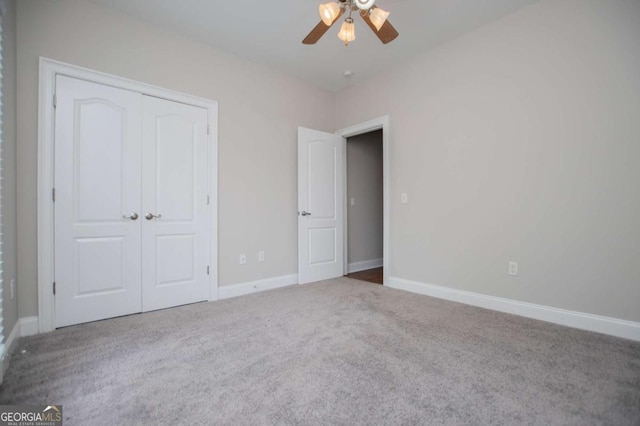 5995 Azalea Ridge Dr, Douglasville, GA 30135 - unfurnished bedroom with carpet floors, a closet, baseboards, and ceiling fan