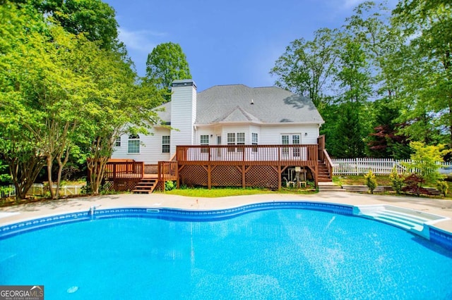 5995 Azalea Ridge Dr, Douglasville, GA 30135 - view of swimming pool featuring a deck, stairs, and fence