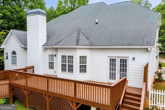 5995 Azalea Ridge Dr, Douglasville, GA 30135 - back of property with a deck, a shingled roof, a chimney, and stairs