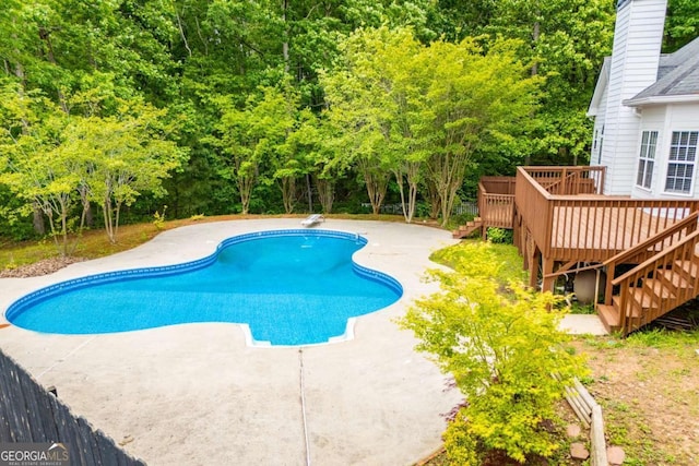 5995 Azalea Ridge Dr, Douglasville, GA 30135 - outdoor pool featuring a wooden deck, a patio, stairs, and a diving board