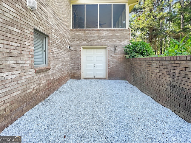 garage featuring fence