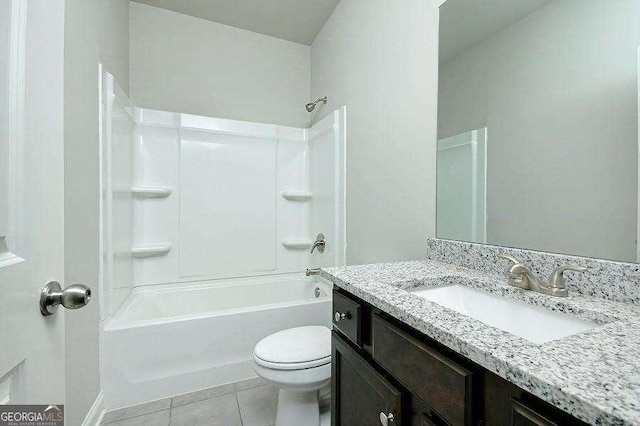 3018 Old Covington Rd Unit 3, Covington, GA 30014 - bathroom featuring toilet, tile patterned floors, bathing tub / shower combination, and vanity