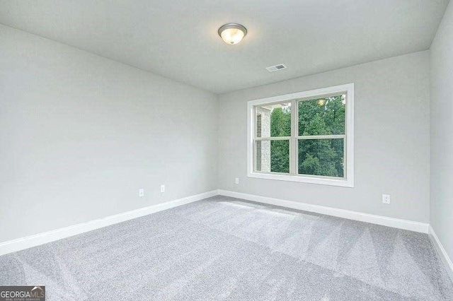 3018 Old Covington Rd Unit 3, Covington, GA 30014 - empty room featuring baseboards and carpet flooring