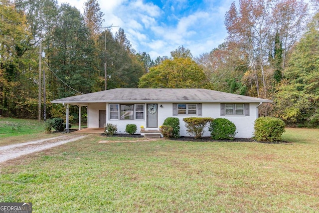 ranch-style house featuring driveway, a front lawn, entry steps, and an attached carport