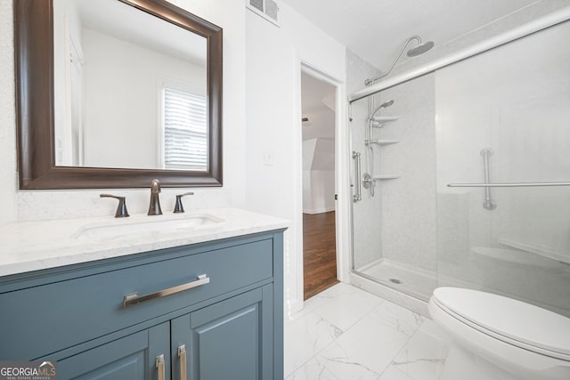 1831 Dresden Dr, Brookhaven, GA 30319 - full bath featuring vanity, a shower, marble finish flooring, and toilet