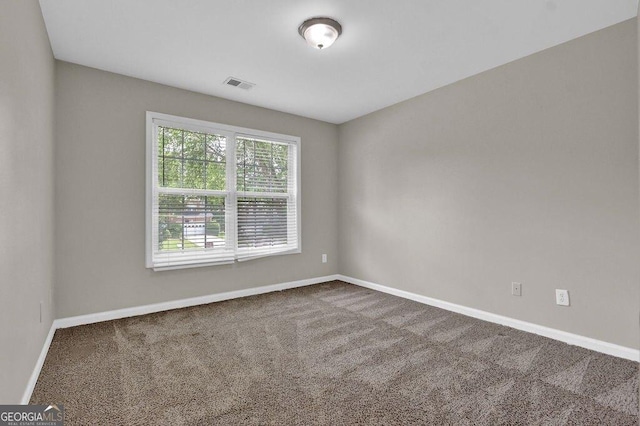 1280 Chandler Ridge Dr, Lawrenceville, GA 30045 - spare room featuring carpet floors and baseboards