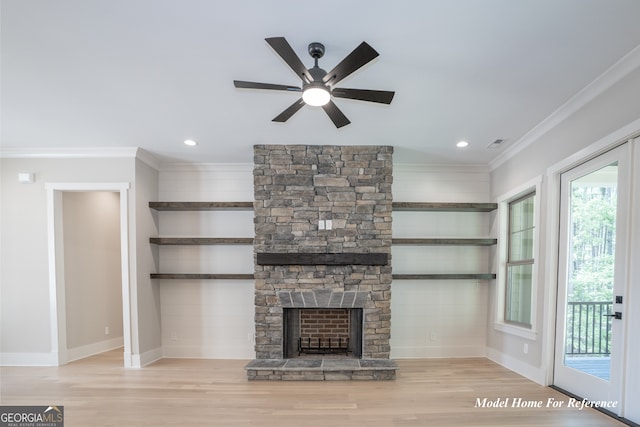 unfurnished living room featuring ornamental molding, a ceiling fan, healthy amount of natural light, wood finished floors, and recessed lighting