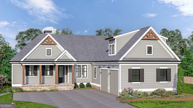 view of front of property with a porch, driveway, and a garage