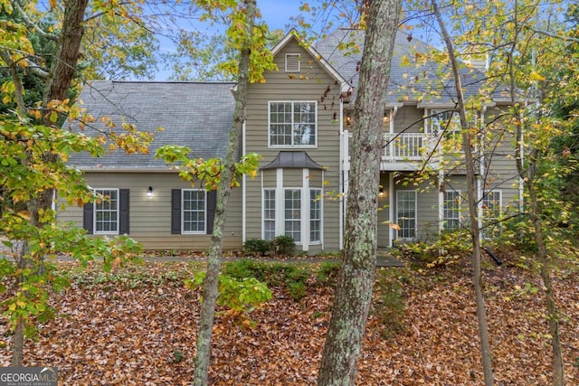 7165 Jonsway, Cumming, GA 30041 - rear view of property with a shingled roof