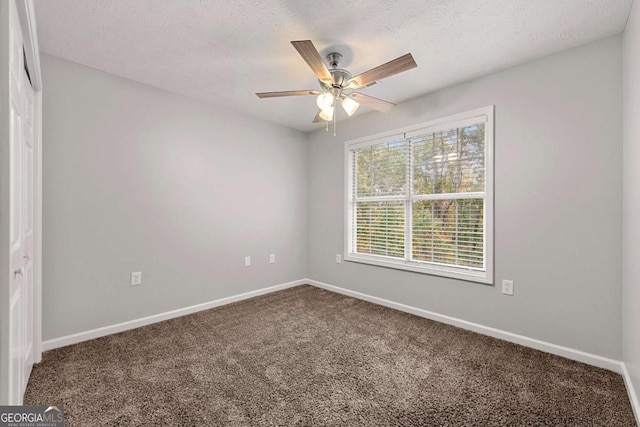 7165 Jonsway, Cumming, GA 30041 - carpeted empty room featuring a ceiling fan, baseboards, and a textured ceiling