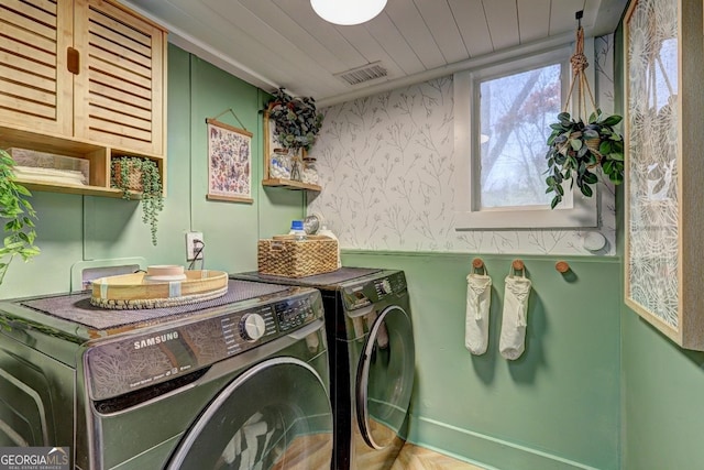 124 Laurel Dr, Barnesville, GA 30204 - laundry room with independent washer and dryer, cabinet space, and wood ceiling