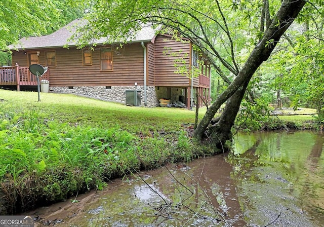 271 The Builders Hl, Morganton, GA 30560 - back of property with crawl space, a wooden deck, cooling unit, and a yard