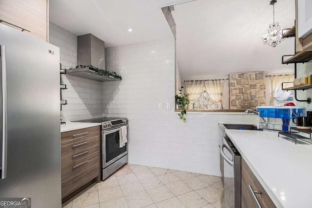 128 Graybrook Ct, Grayson, GA 30017 - kitchen featuring open shelves, stainless steel appliances, wall chimney exhaust hood, light countertops, and light tile patterned floors