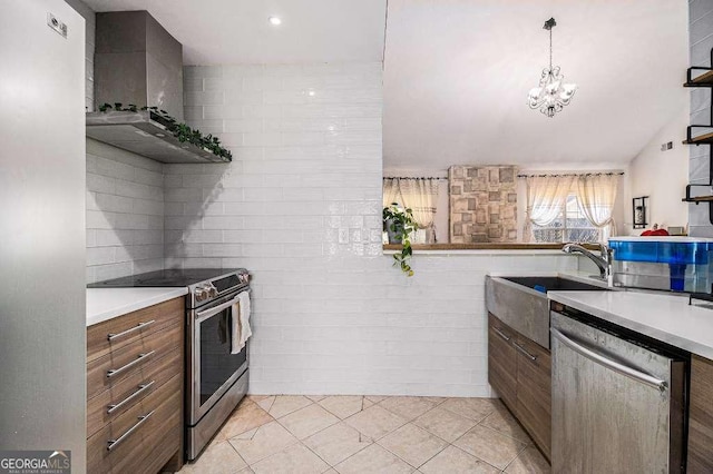 128 Graybrook Ct, Grayson, GA 30017 - kitchen featuring appliances with stainless steel finishes, wall chimney exhaust hood, light countertops, and light tile patterned floors
