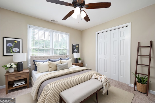 138 Knightwood Pt, Acworth, GA 30101 - bedroom with light colored carpet, a closet, ceiling fan, and baseboards