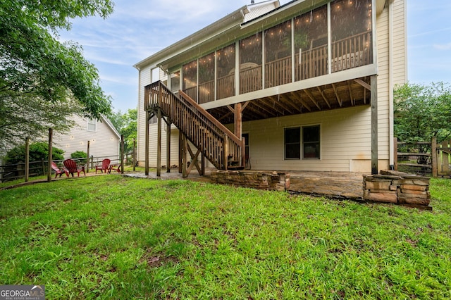138 Knightwood Pt, Acworth, GA 30101 - back of property featuring a sunroom and stairway