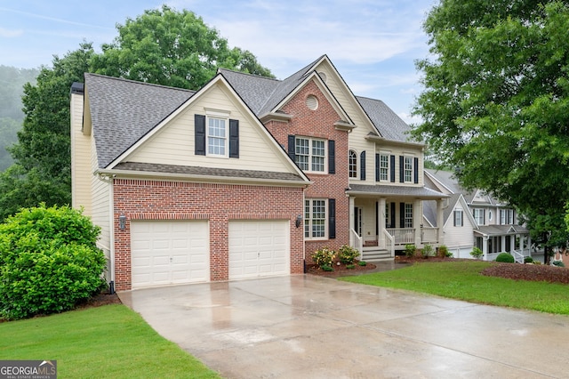 138 Knightwood Pt, Acworth, GA 30101 - view of front facade featuring driveway, covered porch, brick siding, a front yard, and a shingled roof