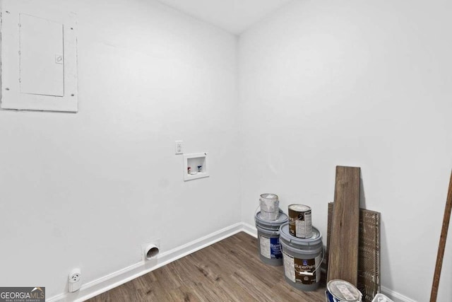 5155 Oakdale Ct, Douglasville, GA 30135 - laundry area with washer hookup, electric panel, wood finished floors, baseboards, and electric dryer hookup