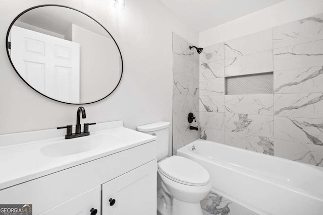 5155 Oakdale Ct, Douglasville, GA 30135 - bathroom featuring marble look tile flooring, toilet, vanity, and  shower combination
