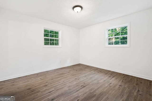 5155 Oakdale Ct, Douglasville, GA 30135 - unfurnished room featuring wood finished floors and baseboards