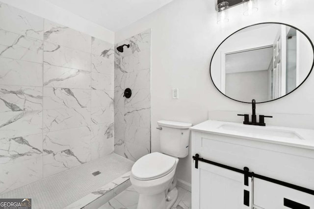 5155 Oakdale Ct, Douglasville, GA 30135 - full bath featuring marble look tiles, tiled shower, toilet, and vanity