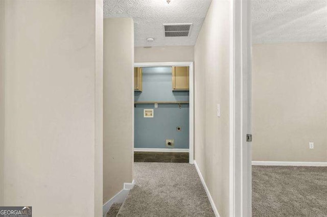 182 Garden Manor Ct, Loganville, GA 30052 - hall featuring a textured ceiling and carpet flooring