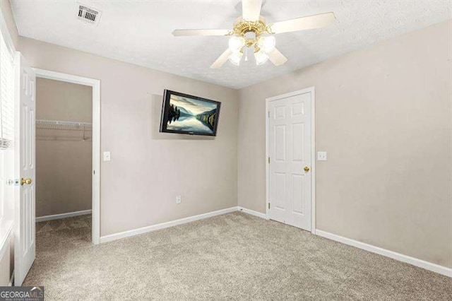 182 Garden Manor Ct, Loganville, GA 30052 - carpeted spare room featuring a ceiling fan and baseboards