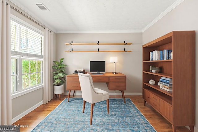 182 Garden Manor Ct, Loganville, GA 30052 - office area with light wood-type flooring and crown molding