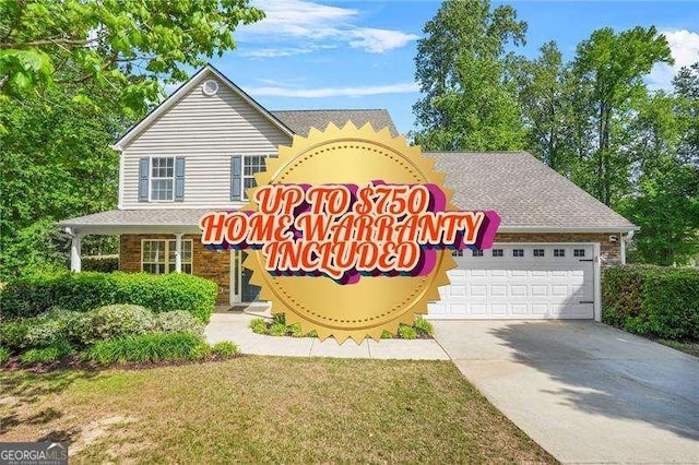 182 Garden Manor Ct, Loganville, GA 30052 - view of front of home with concrete driveway, a garage, and a front yard