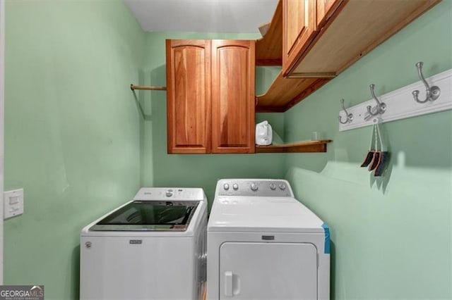 10890 Regal Frst, Suwanee, GA 30024 - laundry room with cabinet space and independent washer and dryer