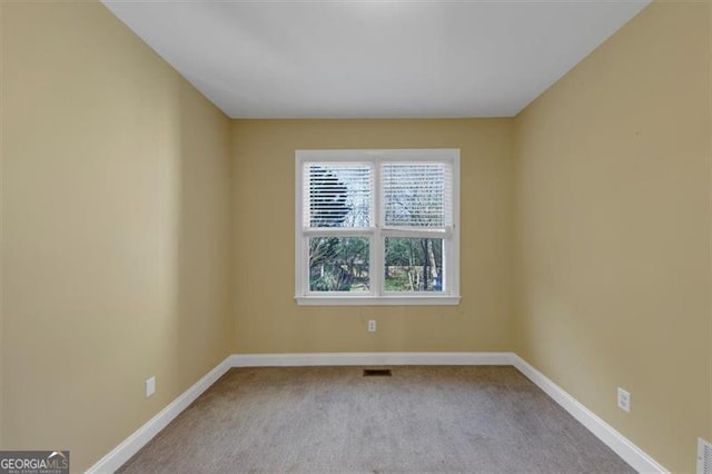 10890 Regal Frst, Suwanee, GA 30024 - carpeted spare room with baseboards