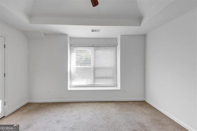 10890 Regal Frst, Suwanee, GA 30024 - carpeted empty room featuring a tray ceiling, baseboards, and ceiling fan