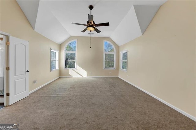 10890 Regal Frst, Suwanee, GA 30024 - unfurnished room with a ceiling fan, baseboards, carpet floors, and vaulted ceiling