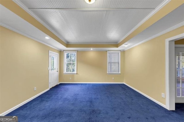 10890 Regal Frst, Suwanee, GA 30024 - spare room featuring a raised ceiling, dark carpet, crown molding, plenty of natural light, and recessed lighting