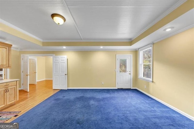 10890 Regal Frst, Suwanee, GA 30024 - spare room with a tray ceiling, crown molding, light carpet, baseboards, and recessed lighting