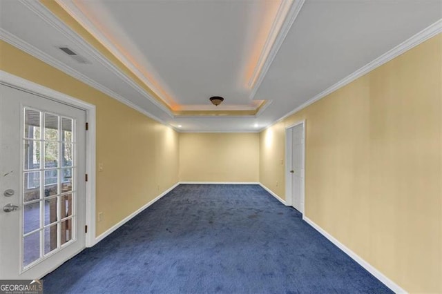10890 Regal Frst, Suwanee, GA 30024 - spare room with crown molding, dark colored carpet, a tray ceiling, and baseboards