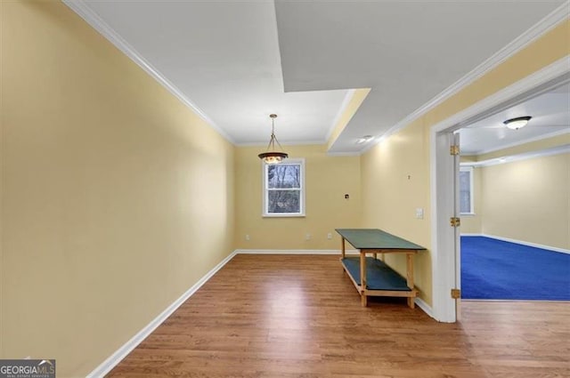 10890 Regal Frst, Suwanee, GA 30024 - empty room featuring ornamental molding, wood finished floors, and baseboards