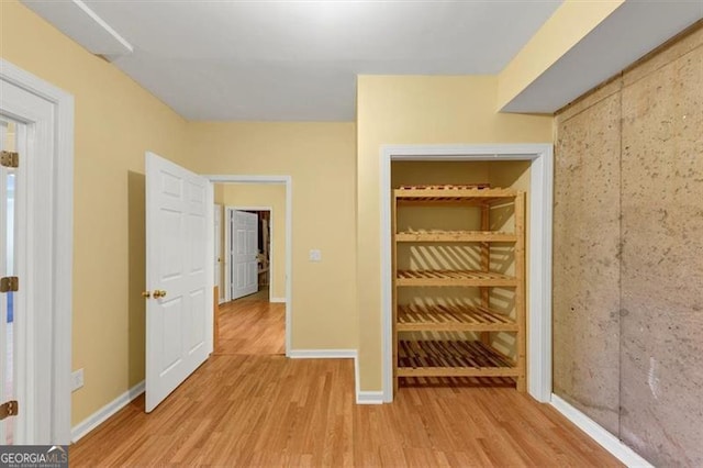 10890 Regal Frst, Suwanee, GA 30024 - unfurnished bedroom with light wood finished floors and baseboards