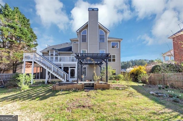 10890 Regal Frst, Suwanee, GA 30024 - rear view of house with a vegetable garden, a chimney, a pergola, and a wooden deck