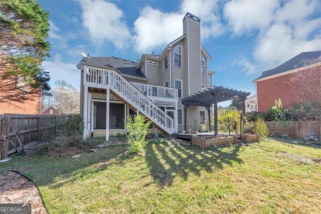 10890 Regal Frst, Suwanee, GA 30024 - rear view of property featuring a pergola, a wooden deck, a chimney, stairs, and a vegetable garden