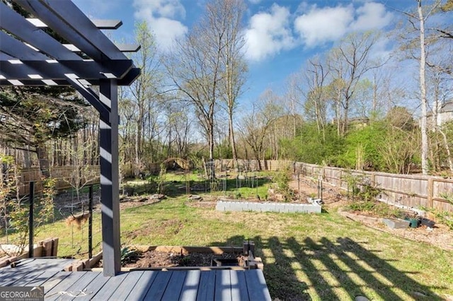 10890 Regal Frst, Suwanee, GA 30024 - view of yard featuring a vegetable garden, a wooden deck, and a pergola
