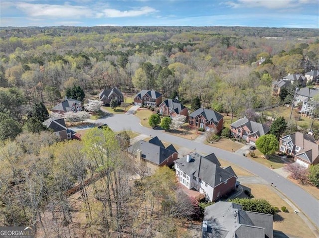 10890 Regal Frst, Suwanee, GA 30024 - aerial view of property's location featuring a heavily wooded area and nearby suburban area