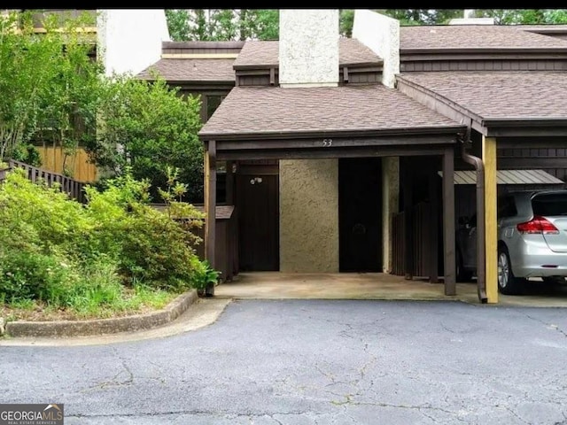 garage featuring fence