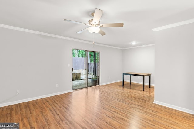 spare room featuring a ceiling fan, crown molding, light wood-style floors, baseboards, and recessed lighting