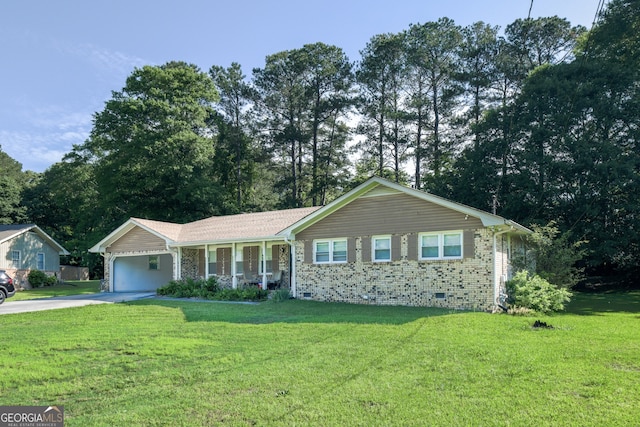 2628 Hickory Trl, Snellville, GA 30078 - single story home with concrete driveway, a front lawn, an attached garage, and crawl space
