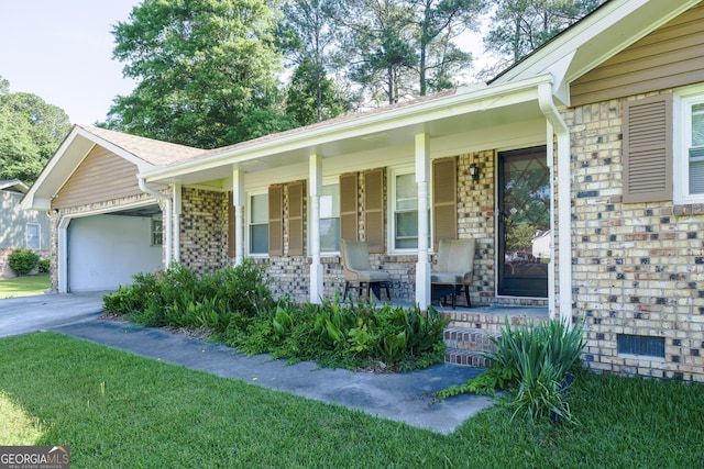2628 Hickory Trl, Snellville, GA 30078 - ranch-style house with covered porch, a garage, concrete driveway, stone siding, and a front lawn