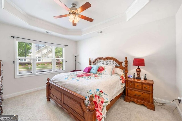 306 Cherokee Station Cir, Woodstock, GA 30188 - bedroom featuring a raised ceiling, light carpet, ornamental molding, and a ceiling fan